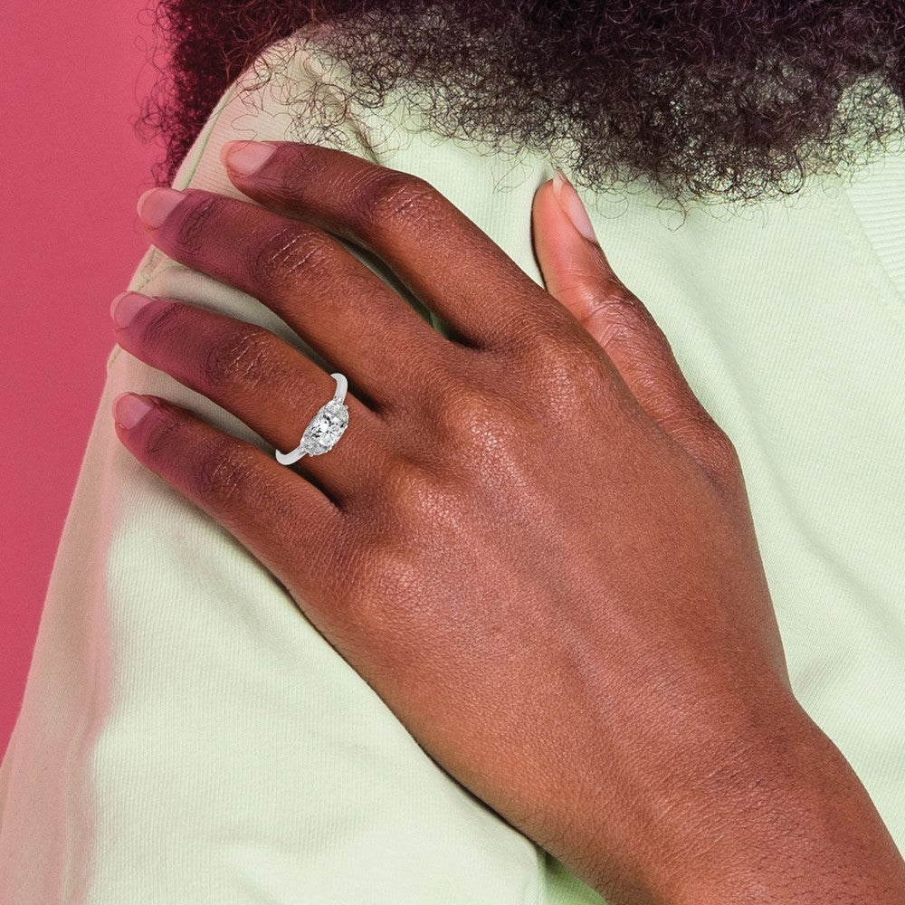 Cushion lab-grown diamond three-stone engagement ring in 14K white gold