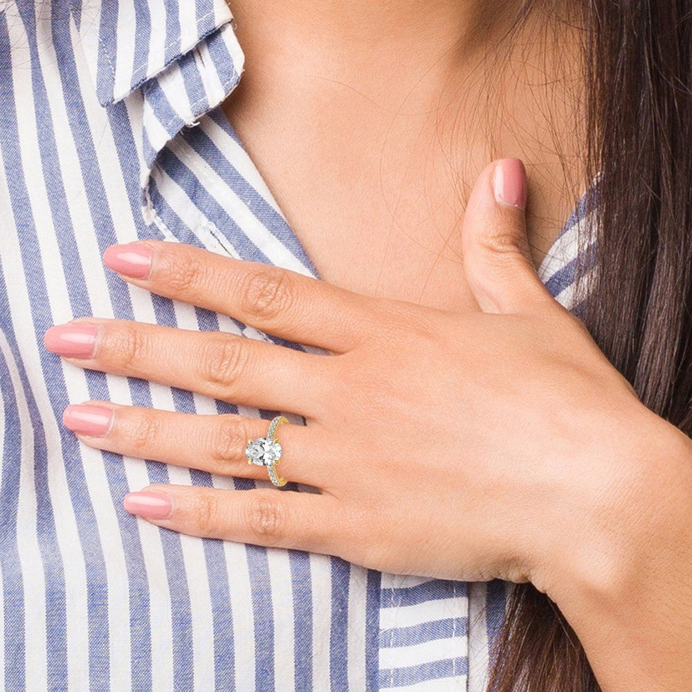 Oval lab-grown diamond solitaire engagement ring in 14K yellow gold